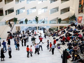 People dance to the music of the Emeralds during Swing and Skate at City Hall in Edmonton on Sunday, Jan. 7, 2018.