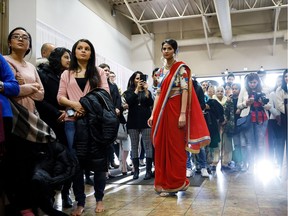 A model struts her stuff during the unveiling of Anika Designs' Spring Summer Collection in Edmonton on Sunday, Jan. 14, 2018.