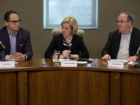 Premier Rachel Notley (centre) addresses an emergency provincial cabinet meeting following the latest setback on the Trans Mountain pipeline expansion at the Federal building in Edmonton Wednesday Jan. 31, 2018.