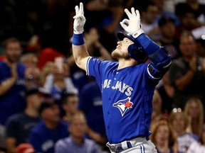 Josh Donaldson #20 of the Toronto Blue Jays celebrates after hitting a home run against the Boston Red Sox during the third inning at Fenway Park on September 26, 2017 in Boston, Massachusetts.