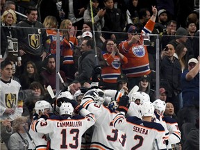 The Edmonton Oilers celebrate after Darnell Nurse scored an overtime goal against the Vegas Golden Knights to win their game 3-2 at T-Mobile Arena on January 13, 2018 in Las Vegas, Nevada.