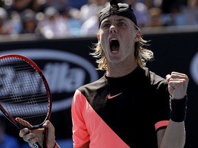 Denis Shapovalov celebrates his first-round win over Stefanos Tsitsipas at the Australian Open on Jan. 15.