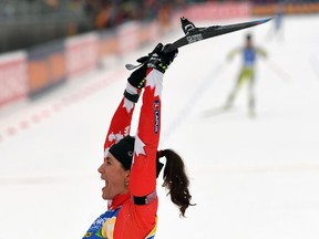 Rosanna Crawford celebrates her third-place finish in the IBU Biathlon World Cup Women's Individual in Ruhpolding, Germany, on Jan. 11.