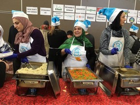 Volunteers serve about 1,200 meals at the Bissell Centre, 9538 103A Ave., on New Year's Day, Jan. 1, 2018.