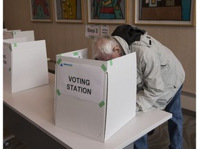 Advance voting for the 2017 municipal election in the Heritage Room at City Hall voting stations on Friday Oct. 13, 2017 in Edmonton.