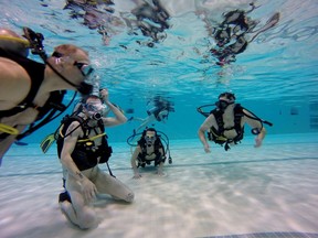 Members of the CottonTail Corners naturist group hold a nude scuba class at Scona Pool in 2016.