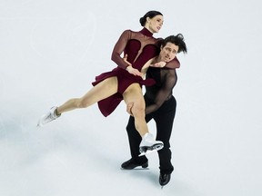 Tessa Virtue, left, and Scott Moir perform their free dance during the senior dance competition at the Canadian Figure Skating Championships in Vancouver on Jan. 13.