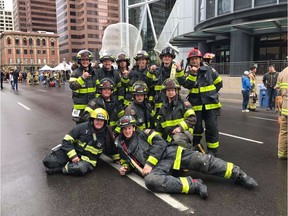 Members of the Grande Cache Fire Department pose for a photo at the Bow Tower firefighter stair climb in Calgary in May 2017. Back row, from left: Ryan Skanes, Jordan Kirkeby, Chris Layes, Aandrea Gardiner, Rylen Trimble, John Wareniyca. Middle row: Kris James, Dominic Lacroix, Phil Howe. Front row: Mark McFadden, Bryon Redknap.