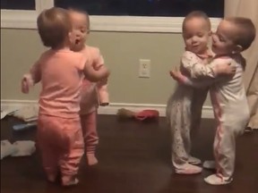 A still from a viral video shows the Webb quadruplets in the midst of a hug-fest that lasted about 15 minutes, said mother Beth Webb.