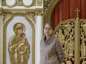 Dr. Jelena Pogosjan, director of the Kule Folklore Centre at the University of Alberta, is seen in the Images of Faith, Hope and Beauty exhibit at Enterprise Square in Edmonton, Alberta on Friday, Jan. 5, 2018. The exhibit celebrates Eastern Othodox culture ahead of the Eastern Orthodox Christmas on Sunday, Jan. 7.