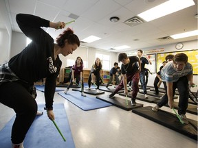 Pound instructor is Zita Dube-Lockhart leads a class of students in a music performance activity at a Mental Wellness Symposium held at Cardinal Leger Jr. High School in Edmonton, Alberta on Thursday, Jan. 18, 2018.