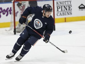 Edmonton's Michael Cammalleri (13) flips a puck during an Edmonton Oilers practice at Rogers Place in Edmonton, Alberta on Monday, Jan. 29, 2018.