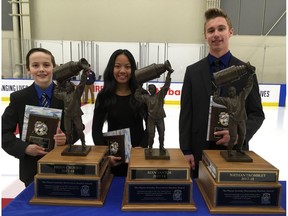 Brian Crossman, left, Ryan Santos and Nathan Trombley are this year's recipients of the Wayne Gretzky Award as part of the launch of the 55th annual Quikcard Edmonton Minor Hockey Week on Wednesday, Jan. 10, 2018. (Jason Hills)