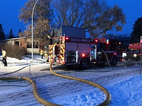 Firefighters respond to a blaze at a duplex in the Canora neighbourhood, 10537 154 St. NW, on Monday, Jan. 22, 2018.