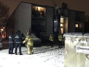 Edmonton fire crews battle a blaze at a walkup in the Eastwood neighbourhood near 86 Street and 118 Avenue on Thursday, Jan. 25, 2018.