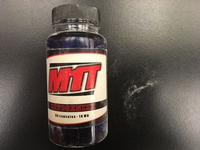 A bottle of Methyl-1-testosterone, or M1T, entered into evidence during the trial of Det. Greg Lewis at Court of Queen's Bench on Jan. 17, 2018.