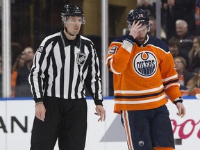 The Edmonton Oilers' Patrick Maroon (19) heads to the penalty box during third period NHL action against the Los Angeles Kings at Rogers Place in Edmonton Tuesday, Jan. 2, 2018.