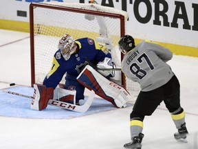 Metropolitan Division's Sidney Crosby (87), of the Pittsburgh Penguins, shoots wide of Atlantic Division goalie Carey Price, of Montreal Canadiens, during the NHL hockey All-Star game Sunday, Jan. 28, 2018 in Tampa, Fla.
