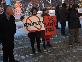 Edmontonians attend a rally at the Alberta legislature on Monday, Jan. 29, 2018 to commemorate the one-year anniversary of the fatal Quebec mosque shooting that left six people dead and another 19 injured.