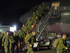 Canadian soldiers who were deployed on Operation Reassurance to Latvia return home to Edmonton on Friday, Jan. 19, 2018.