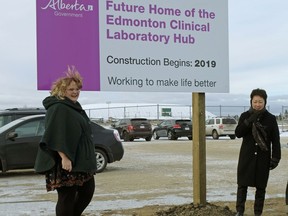 Alberta Health Minister Sarah Hoffman, left, and Dr. Verna Yu, CEO, Alberta Health Services, unveiled the location for a new integrated public lab facility in Edmonton on  Dec. 21, 2017.