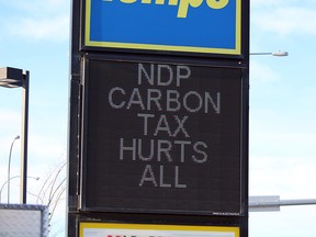 A Tempo station sparked controversy with a sign directing profanity at the Alberta NDP and the prime minister.