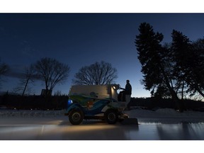 Jules Chabot floods the ice on the Victoria Park Speed Skating Oval on Thursday, Jan. 18, 2018 in Edmonton. Greg  Southam / Postmedia