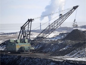 A giant dragline works in the Highvale Coal Mine to feed the nearby Sundance Power Plant near Wabamun. File photo.
