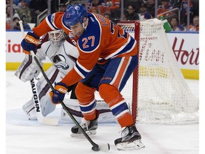 Edmonton Oilers forward Milan Lucic (27) steers in front of Colorado Avalanche goaltender Calvin Pickard (31) at Rogers Place in Edmonton on March 25, 2017. (File)