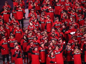 Canadian athletes march into the opening ceremony at the Pyeongchang Olympics on Feb. 9.
