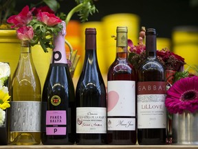 A selection of special Valentine's Day wine paired with flowers for the special occasion, at  Zocalo, 10826 95 St., in Edmonton on Feb. 7, 2018.