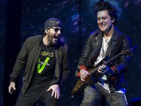 Avenged Sevenfold's M. Shadows, left, and Sinister Gates perform at Rogers Place in Edmonton on Thursday, Feb. 15, 2018.