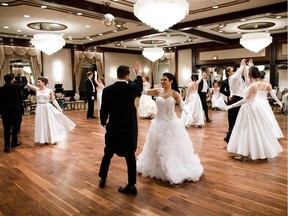 Dancers prepare during the 43rd Johann Strauss Ball at the Chateau Lacombe in Edmonton on Saturday, Feb. 10, 2018.