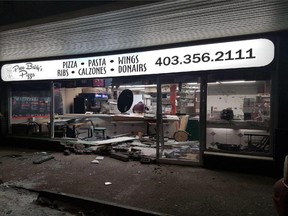 Police are investigating after a truck drove into the Papa Baldy’s Pizza restaurant in Red Deer, AB, on Thursday, Feb.1, 2018. (Photo: Facebook)