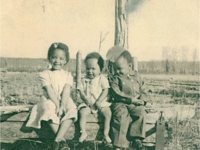 Three children from the Wildwood area. Wildwood, 120 km west of Edmonton, was one of the original black communities, settled primarily by pioneers from Oklahoma, who arrived here between 1907 and 1911.