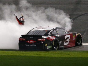 Austin Dillon, driver of the #3 DOW Chevrolet, celebrates winning the Monster Energy NASCAR Cup Series 60th Annual Daytona 500 at Daytona International Speedway on February 18, 2018 in Daytona Beach, Florida. (Photo by Sarah Crabill/Getty Images)