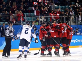 GANGNEUNG, SOUTH KOREA - FEBRUARY 21:  Maxim Noreau #56 of Canada celebrates with teammates after scoring a goal in the third period against Finland during the Men's Play-offs Quarterfinals on day twelve of the PyeongChang 2018 Winter Olympic Games at Gangneung Hockey Centre on February 21, 2018 in Gangneung, South Korea.