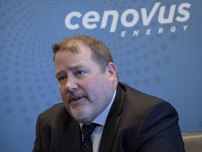 Cenovus president and CEO Alex Pourbaix speaks with reporters at the company's headquarters in Calgary.