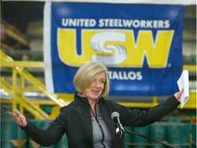 Premier Rachel Notley gestures as she speaks to steel workers, company representatives and media following a tour of Tenaris, a manufacturer and supplier of steel pipe products in Calgary on Friday, Feb. 9, 2018.