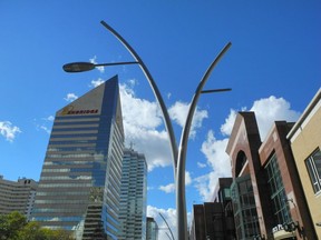 New streetlights featuring LED lights are being installed along Jasper Avenuen in  downtown Edmonton on September 19.  Photo by Shaughn Butts / Postmedia   Standalone photo