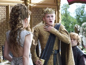 This image released by HBO shows Natalie Dormer, left, Jack Gleeson, Peter Dinklage, right in a scene from "Game of Thrones."