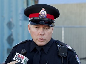 Sgt. Kevin Fald from west division speaks during an Edmonton Police Service news conference regarding the largest seizure of stolen goods in the police service's history in Edmonton, Alta., on Thursday, Sept. 12, 2013.