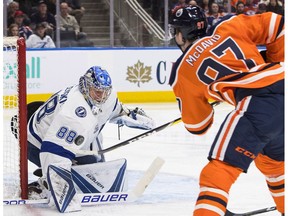 Tampa Bay Lightning' goalie Andrei Vasilevskiy (88) is scored on by Edmonton Oilers' Connor McDavid (97) during second period NHL action in Edmonton on Monday Feb. 5, 2018.