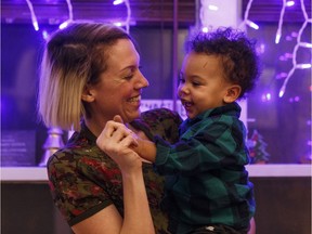 Julia Lipscombe with her son Indiana Lipscombe at home in Edmonton, Wednesday, Dec. 20, 2017.