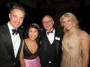 Edmonton Opera Valentine's Gala host Bob Bessette, left, Edmonton's First Lady Sarah Chan, the company's general director Tim Yakimec and co-host Michelle Bessette enjoy a return to the disco era to celebrate the opera's 54th season. Some 800 guests attended the fundraising event at the Shaw Conference Centre on Feb. 14, 2018.