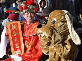 Chinese New Year: Year of the Dog was celebrated in Chinatown on 97 St. with the Lion and dragons firecracker parade in Edmonton, February 17, 2018. Ed Kaiser/Postmedia