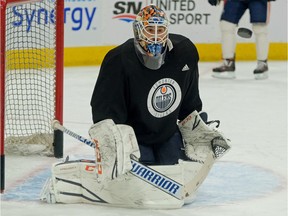 Edmonton Oilers goalie Cam Talbot keeps an eye on the puck during team practice in Edmonton on Friday, Feb. 2, 2018.