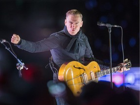 Bryan Adams entertains following the second period as the Ottawa Senators take on the Montreal Canadiens in the 2017 Scotiabank NHL 100 Classic outdoor hockey game at TD Place in Ottawa.