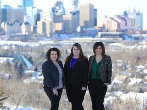 Left to right Melissa Creech, Chelsey McLeod, Erin Davis the co-founders of Works for Women in front of the Edmonton city skyline March 4, 2018. Photo Clayton Davis