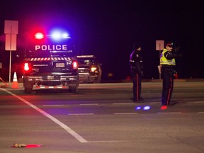 Police blocked off Fox Drive at the entrance to Fort Edmonton Park on Saturday, October 22, 2016 in Edmonton.